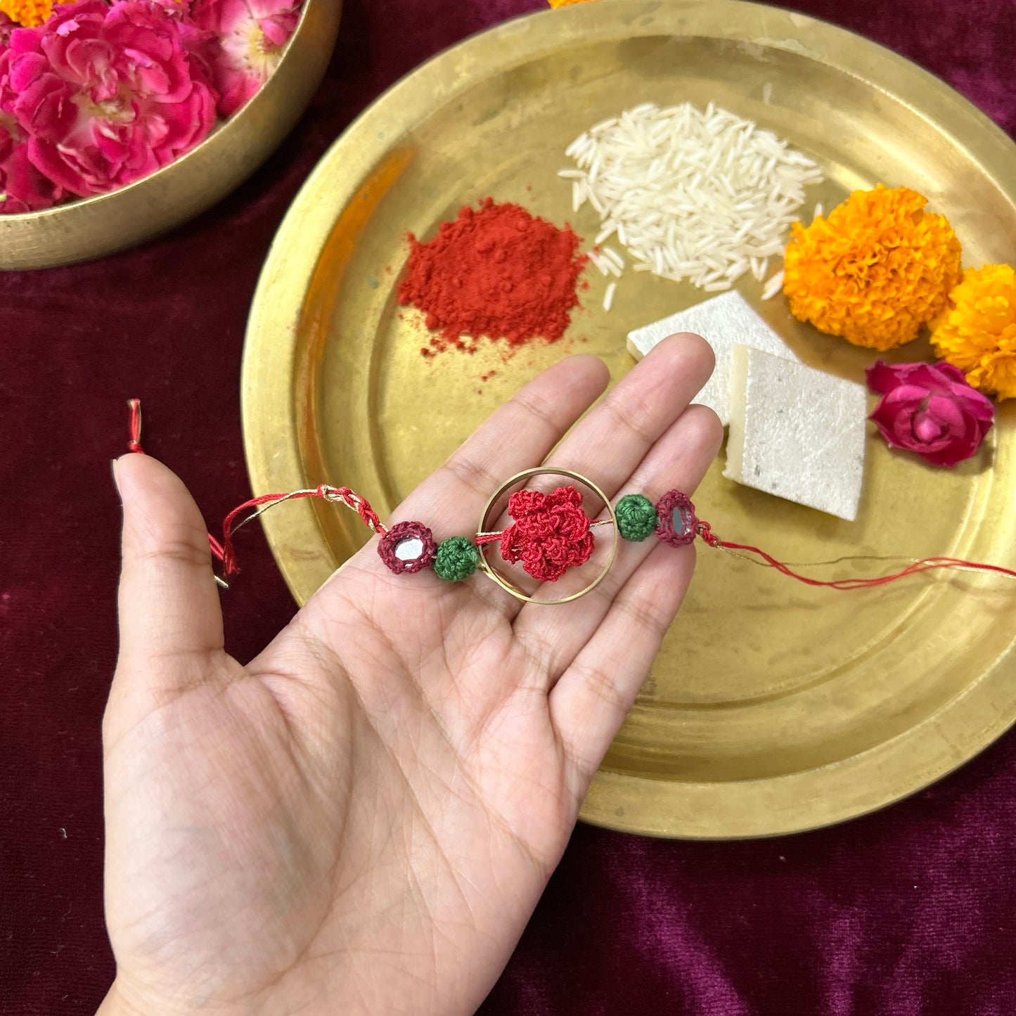 Crochet Rose in a Brass Ring Rakhi