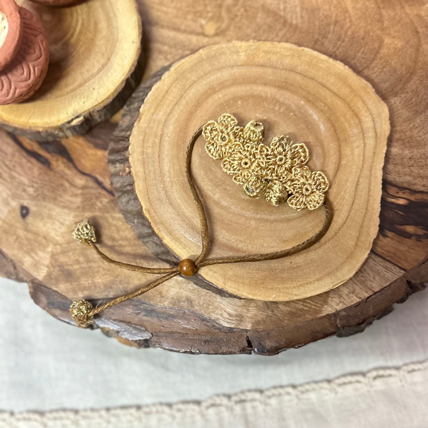 Golden zari crochet rakhi