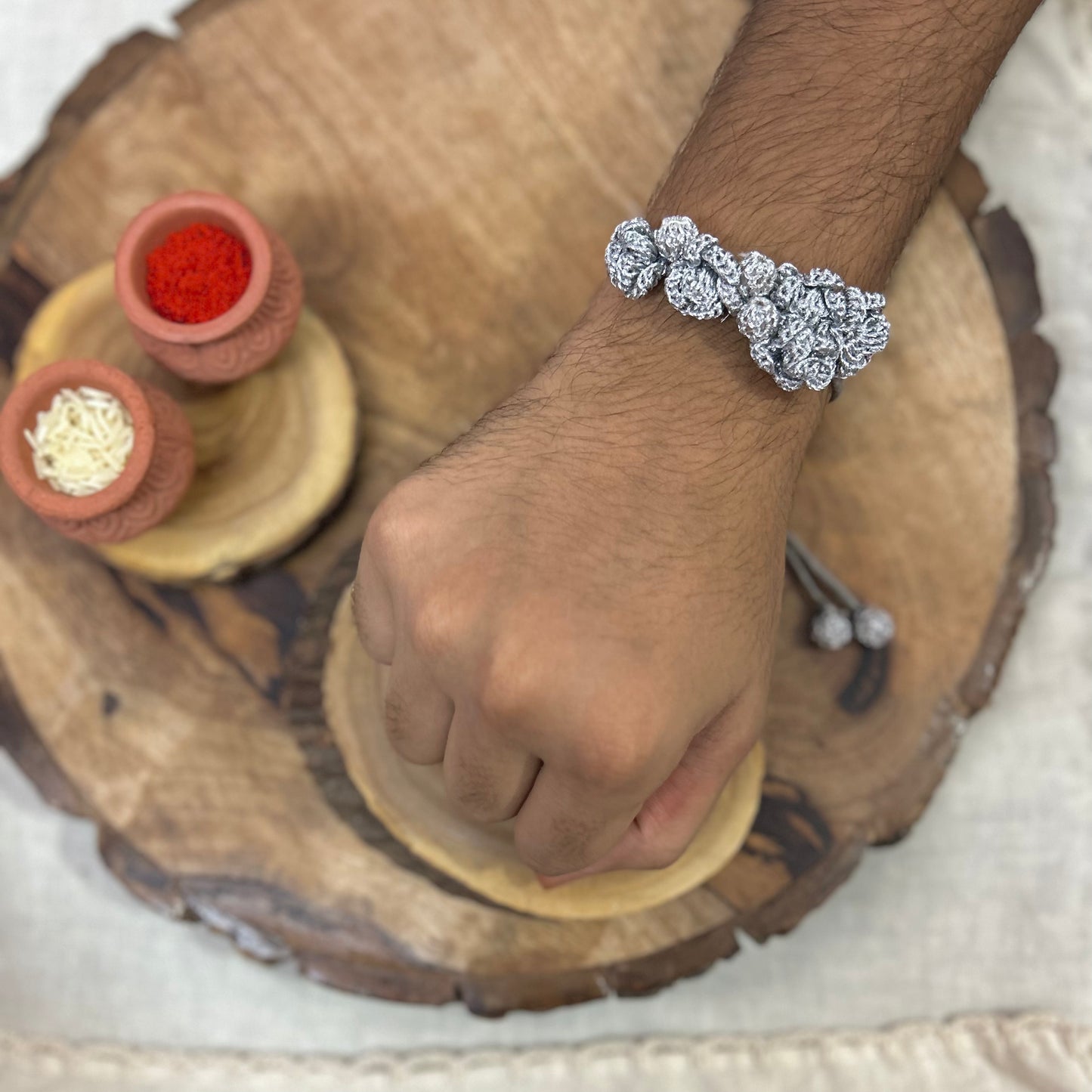 Silver zari crochet rakhi