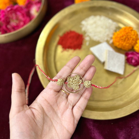 Golden Crochet Flower in a Brass Ring Rakhi