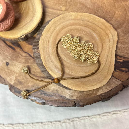 Golden zari crochet rakhi